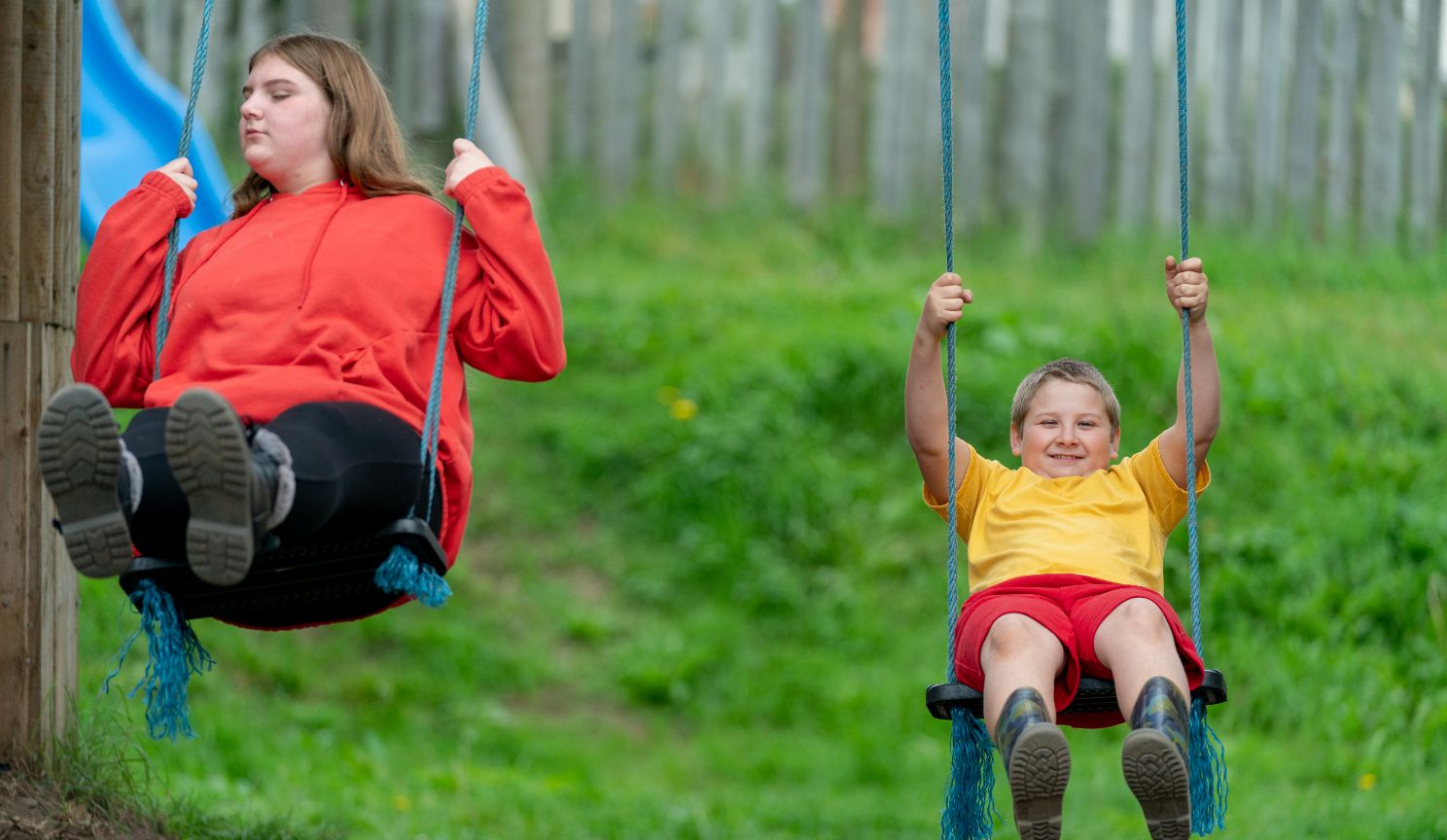 children playing on swings