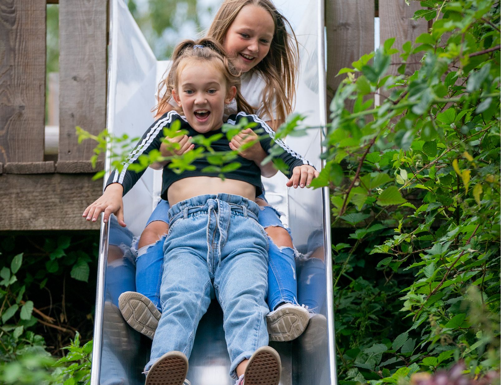 children playing on slide