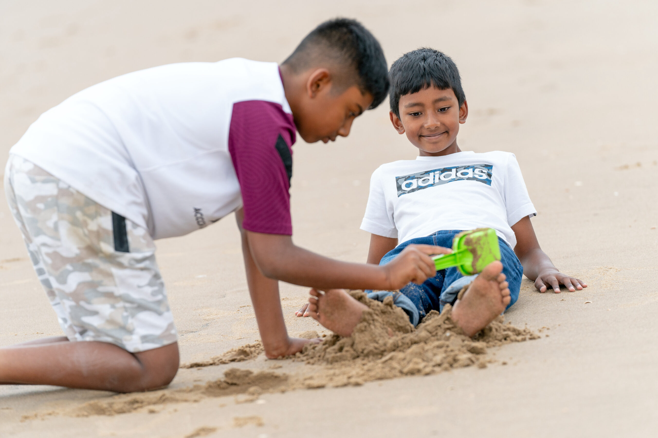 children playing in sand