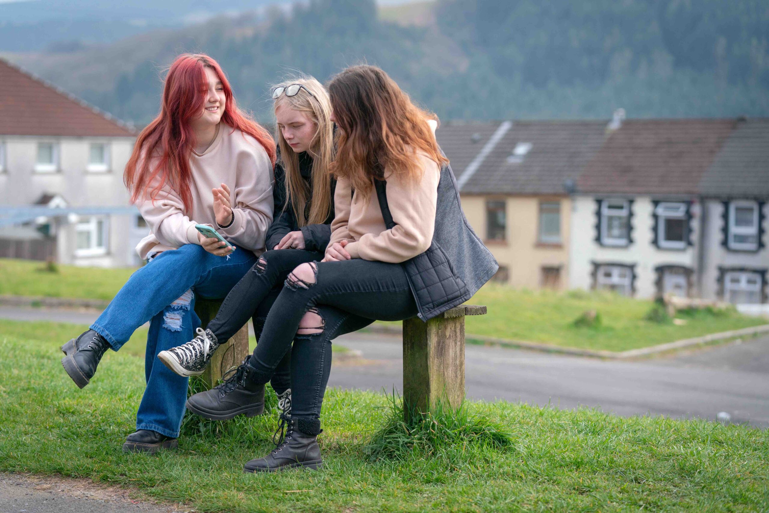 teens on park bench