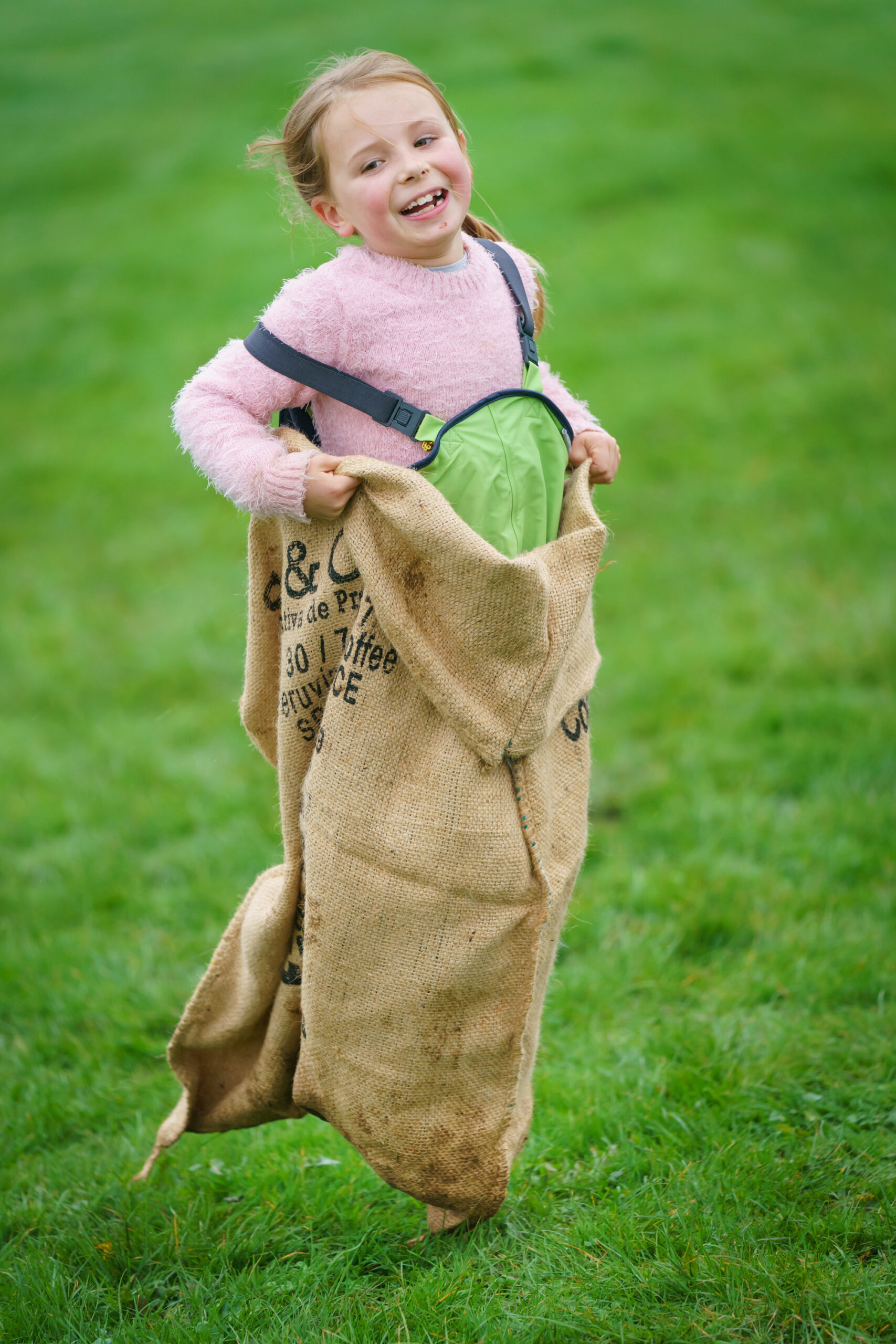 child playing with sack